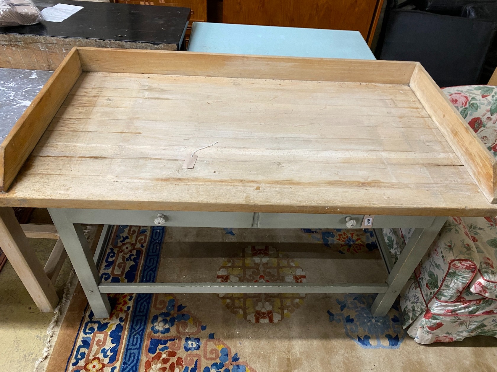 A late 19th / early 20th century part painted pine kitchen table with galleried top, length 150cm, depth 80cm, height 91cm